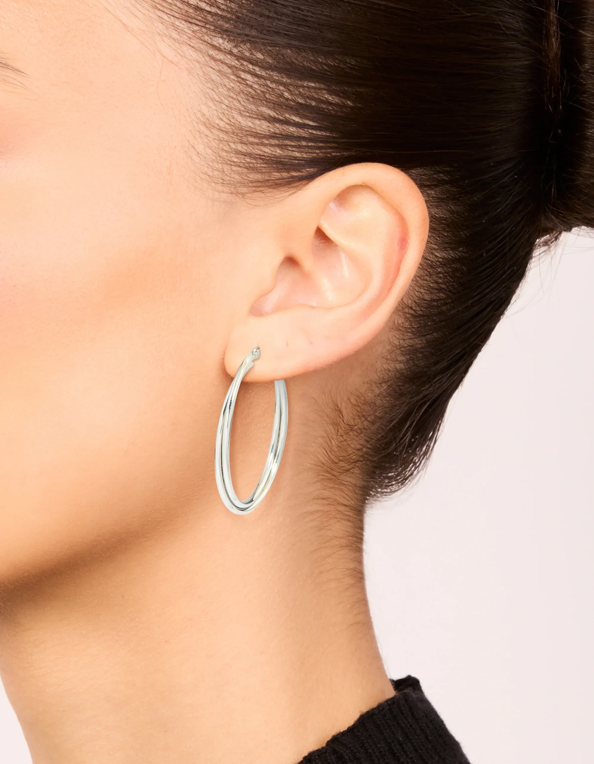 693-surgical-steel-crossover-hoop-earrings-40-mm-1.webp Surgical Steel Crossover Hoop Earrings 40 MM