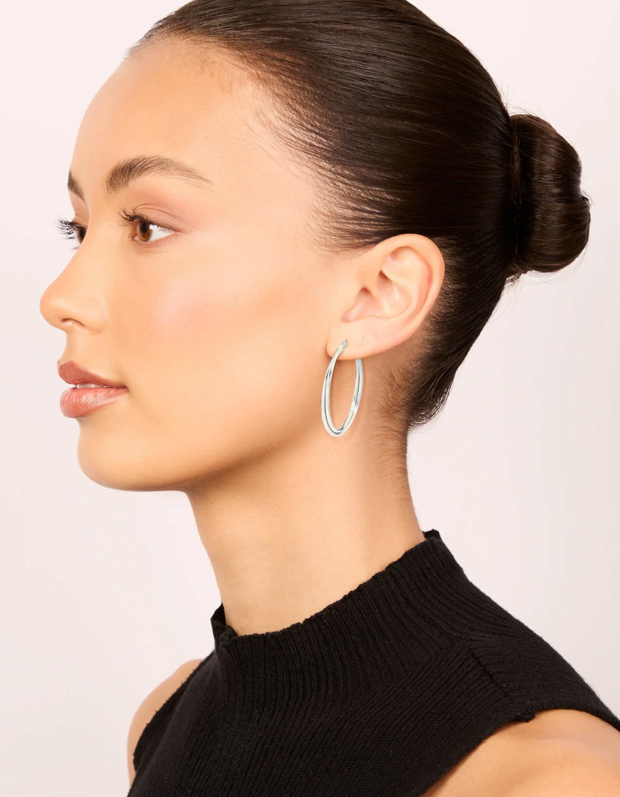 693-surgical-steel-crossover-hoop-earrings-40-mm-3.webp Surgical Steel Crossover Hoop Earrings 40 MM