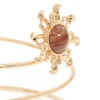 786-gold-sun-swirl-arm-cuff-2.webp Gold Sun & Swirl Arm Cuff