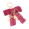 790-red-lace-fabric-bow-hearts-key-chain-1.webp Red Lace Fabric Bow & Hearts Key Chain