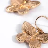 863-gold-butterfly-drop-earrings-3.webp Gold Butterfly Drop Earrings