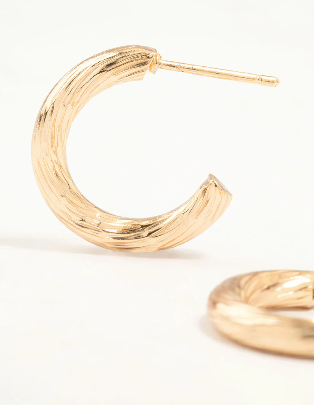 901-gold-fine-textured-hoop-earrings-4.webp Gold Fine Textured Hoop Earrings
