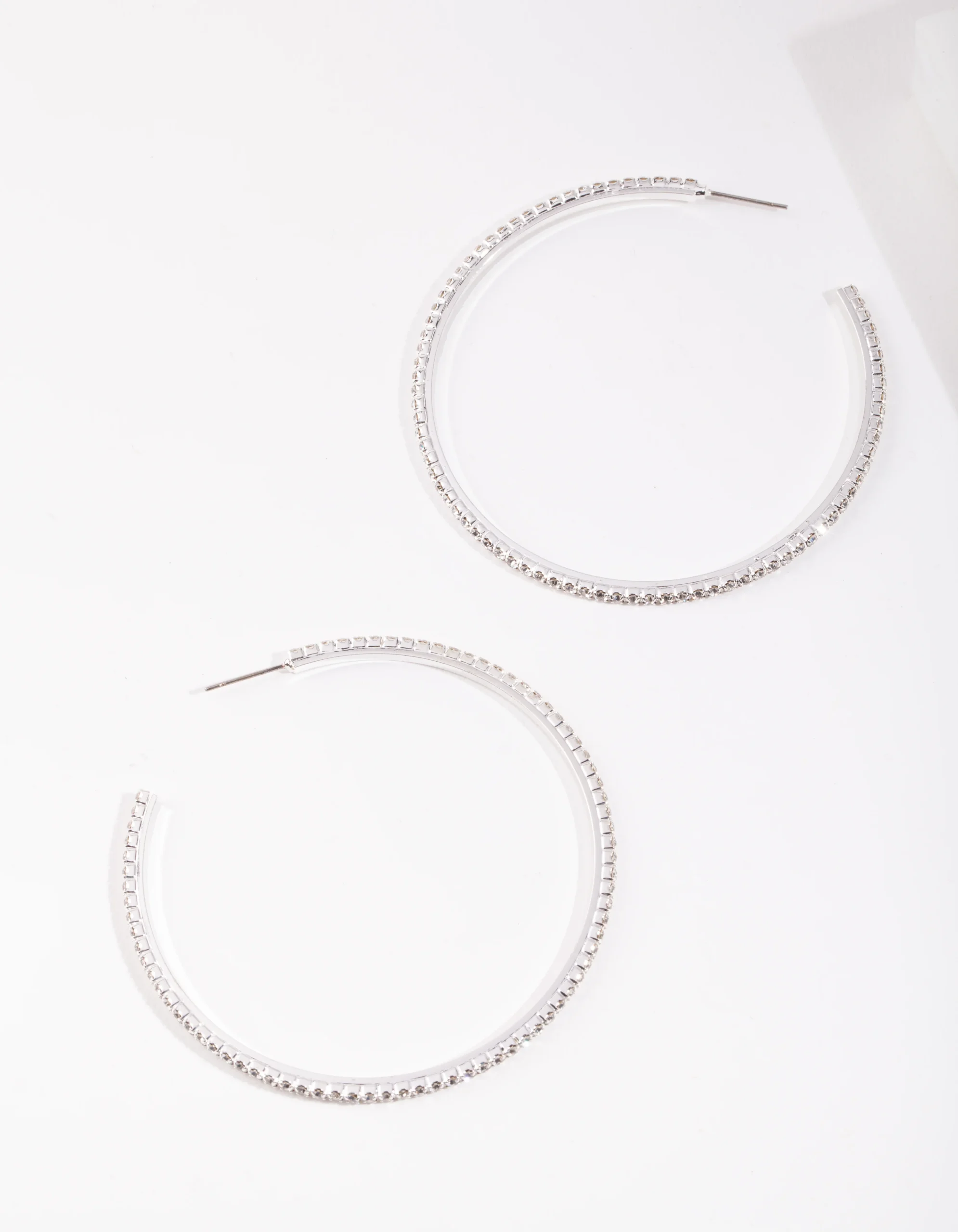 97-silver-oversized-diamante-hoop-earrings-2.webp Silver Oversized Diamante Hoop Earrings