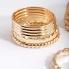 971-gold-textured-band-ring-8-pack-2.webp Gold Textured Band Ring 8-Pack