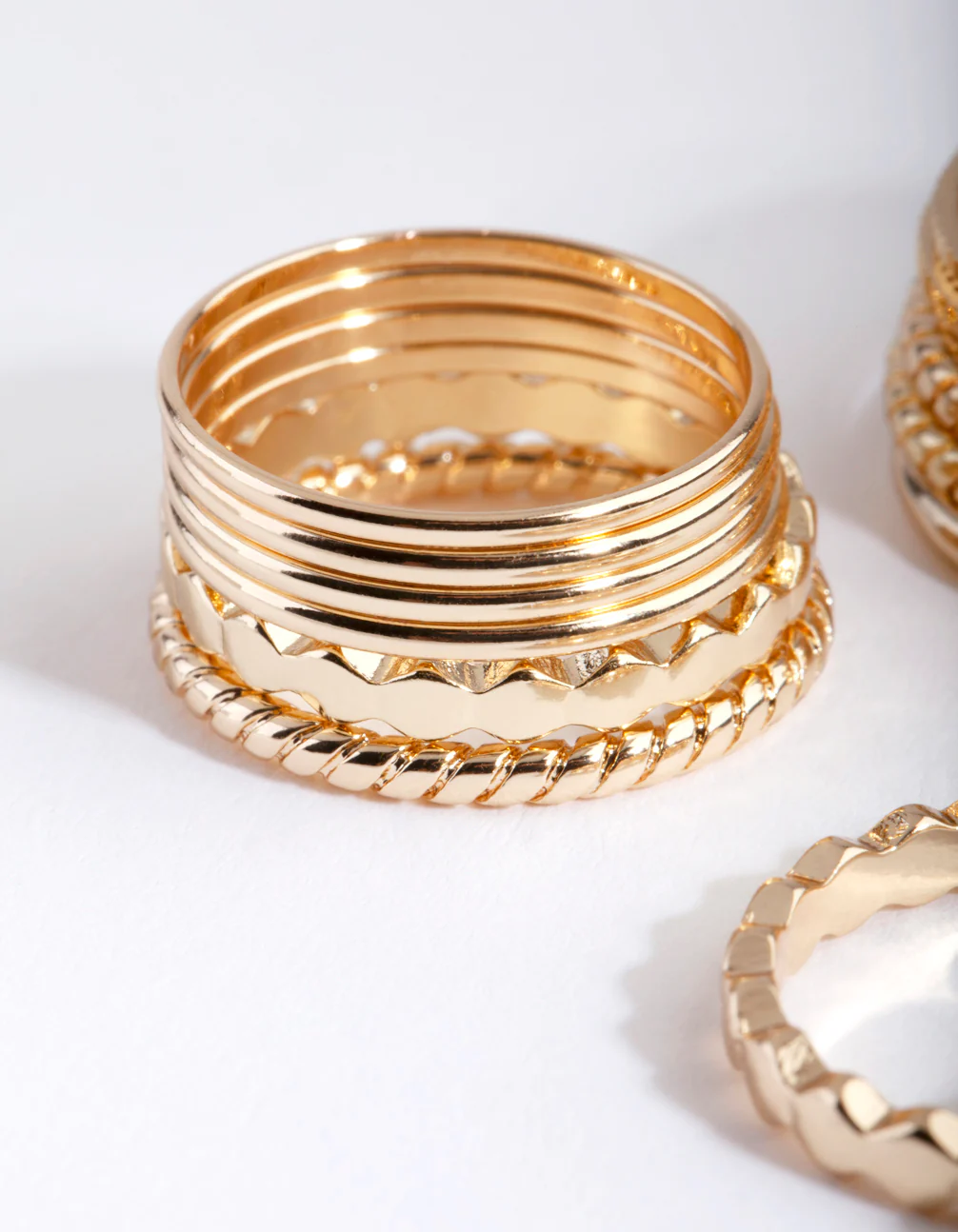 971-gold-textured-band-ring-8-pack-2.webp Gold Textured Band Ring 8-Pack