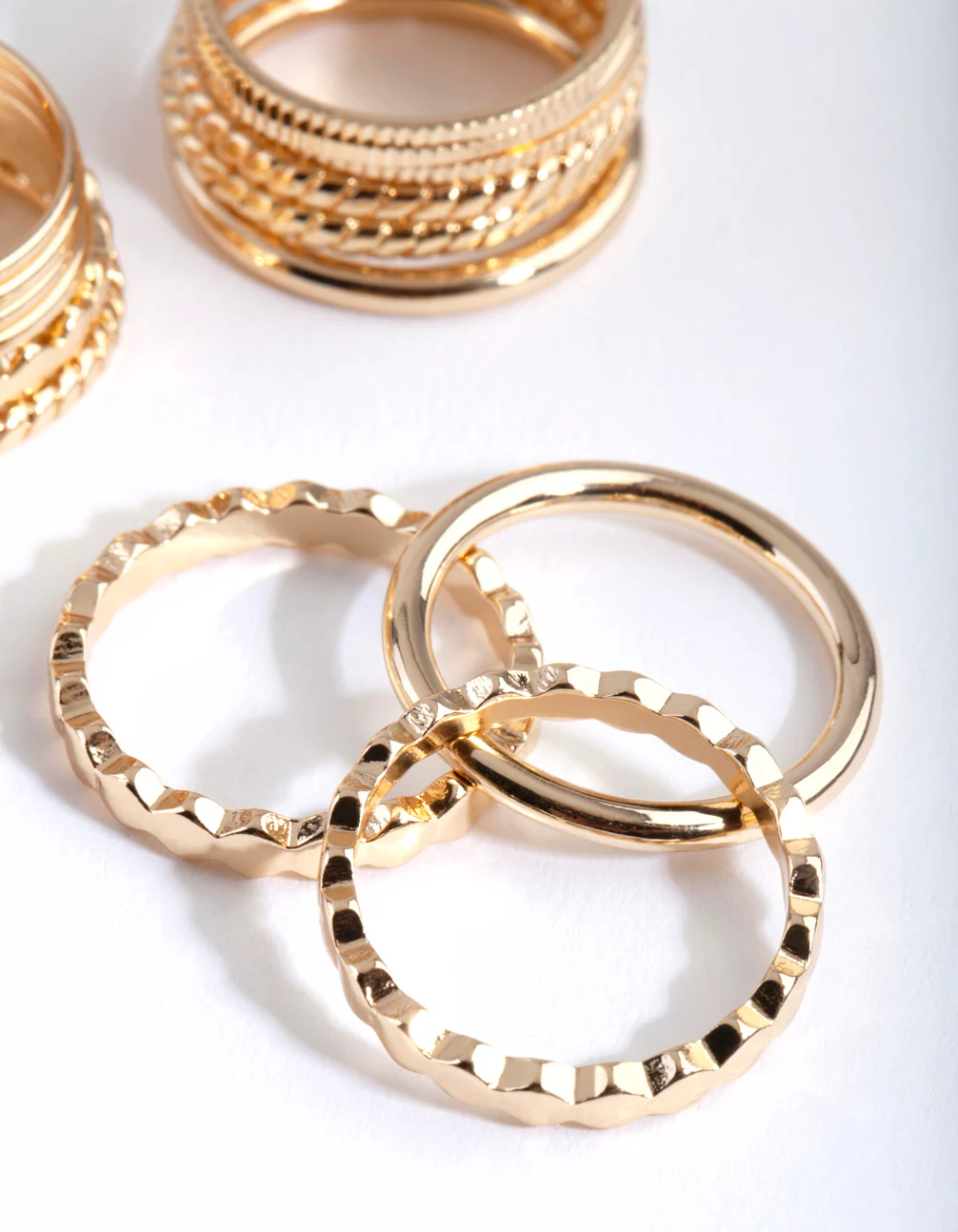 971-gold-textured-band-ring-8-pack-3.webp Gold Textured Band Ring 8-Pack